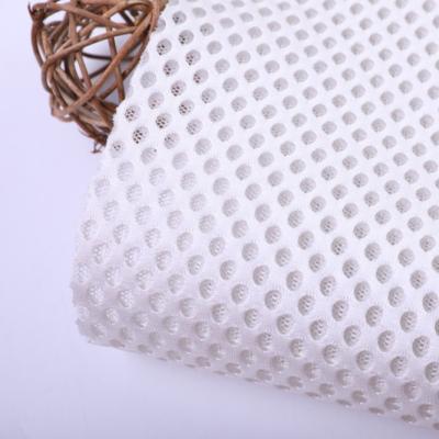 China Custom QUICK DRY 350GSM Polyester Warp Knitted Cushion Dot Sandwich Mesh Fabric For for sale