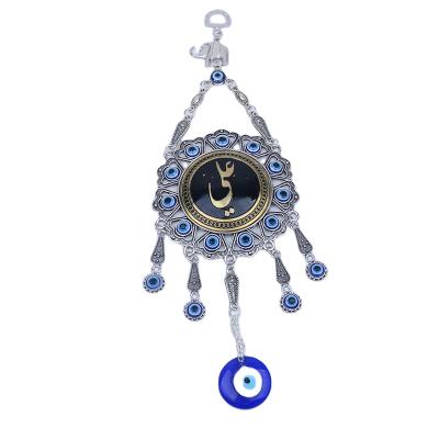 China Asian Zen Wholesale Turkey Hamsa Iron Blue Evil Eye Wall Hanging Drop Crafts For Gifts for sale