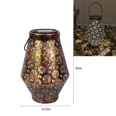 China Outdoor Landscape Handheld Hanging Garden Lawn Lamp Spotlight Lamp Retro Garden Lantern Waterproof Solar LED Light Hollow Solar Light for sale