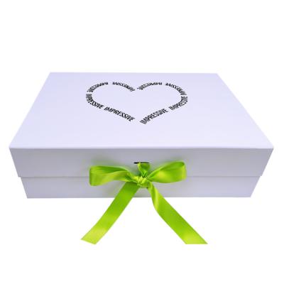 China Recycled Materials Custom Holiday Party Luxury Magnetic Collapsible Gift Box Bridesmaid Proposal White Wedding Favors Gift Box For Guests With Ribbon for sale