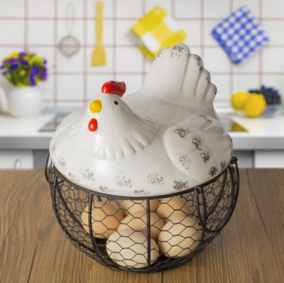 China Creative Blue Ceramic Iron Ceramic Hen Decoration Kitchen Sundries Potato Garlic Fruit Basket Woven Basket Eggs Viable Storage for sale