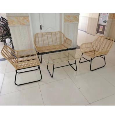 China Durable Handwoven Round 8mm PE Rattan Sofa With Toughened Top 4 Clear Glass Outdoor Garden Table Rattan Sofa Covers for sale