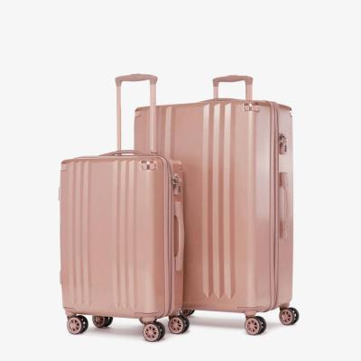 China Popular PC+ABS Amber Travel Hand Luggage Travel Handle Bottom Stock 2 Piece Suitcase With Wheels for sale