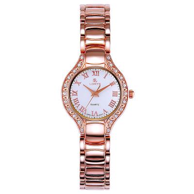 China Women Wholesale Custom Gold Plated Logo Stone Dial Jewelry Watches Ladies Watch for sale