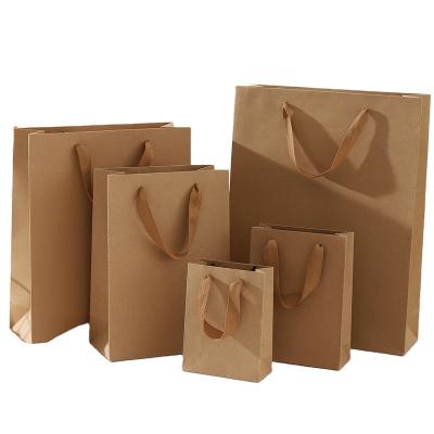 China Free Sample Recycled Materials Luxury Custom Made Your Logo Different Specifications Kraft Paper Bag With Handles for sale