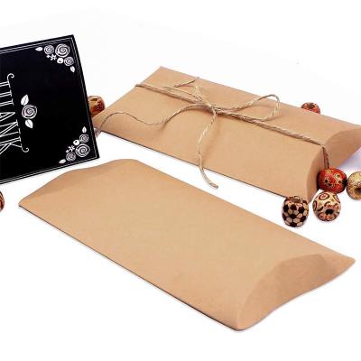 China Hot Sale Factory Disposable Vintage Kraft Paper Candy Stock Custom Pillow Shaped Box With Tags And Rope for sale