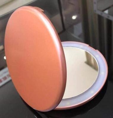 China Custom Portable Magnifying Compact Mirror Lighted With Light Travel Lighted Led Makeup Mirror Touch Sensor for sale