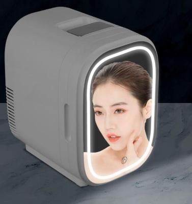 China 110V 8L Mini Compact Fridge Glass Door Hotel Fridge 8L Thermoelectric Car Mini Fridge with LED Cosmetic Mirror for sale