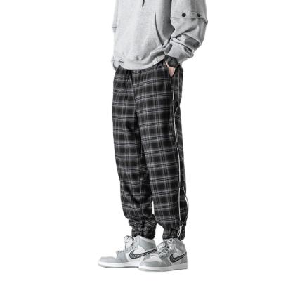 China Hot Selling Men's Retro Plaid Anti-Wrinkle Skinny Stylish Loose Drawstring Casual Pants For Men for sale