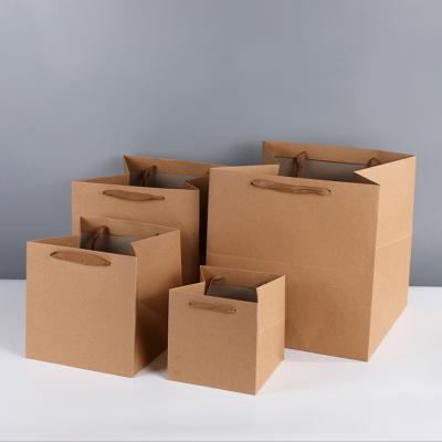 China Recycled Materials Free Eco Friendly Large Square Design Brown Square Kraft Paper Carrier Eco Friendly Shopping Paper Bag for sale