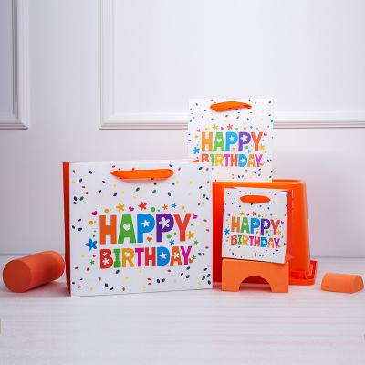 China Recyclable Customized Glossy Logo Middle Kids 3D Birthday Cake Gift Paper Bag for sale