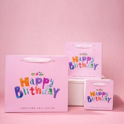 China Recycled Materials Cheap Price Factory Direct Shopping Paper Wholesale Gift Bag Happy Birthday Stain Wrapping Paper Party Gift Wrapping Bags for sale