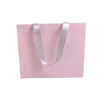 China Recyclable Gift Bag With Handle Eco-friendly Custom Paper Kraft Paper Bag Packaging Logo Print for sale