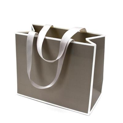 China Recyclable Custom Luxury Garment Gift Paper Shopping Bags With Logo Print for sale