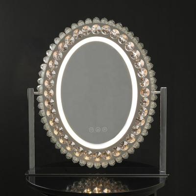 China Luxury Led Cosmetic Mirror Illuminated 12V Espejo Espejo Makeup Mirror Oval Table Crystal Framed Stainless Steel Dresser for sale