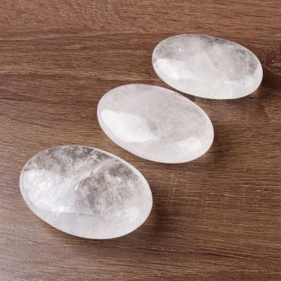 China Europe wholesale natural mineral specimen quartz pebble palm showy clear stone for healing for sale