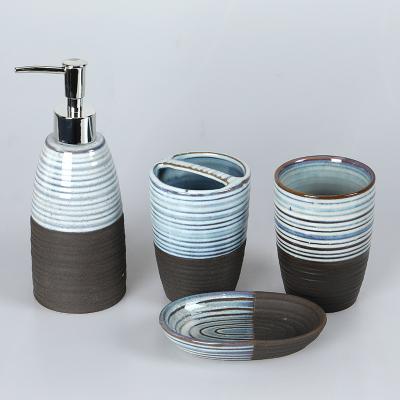 China Eco - Friendly Design Modern Luxury Hotel Stocked Home Decoration 4 Piece Ceramic Bathroom Accessories Set for sale