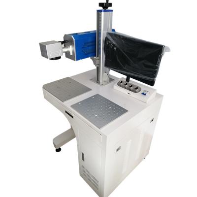 China Good Quality 60W Air Cooled Perfect Automation CO2 Laser Marking Machine With 1 Years Warranty for sale