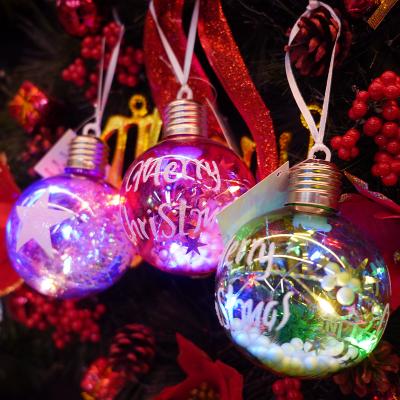 China Festival Creative Light Stuff DIY Christmas Ornaments Plastic Transparent Bulb Shape Snowflake Alphabet Christmas Balls for sale