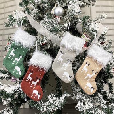 China Wholesale Fashionable Eco-friendly Christmas Decorations Canvas Plush Christmas Stocking For Kids Gift for sale