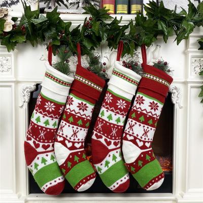 China Nonwoven Fabric Factory Supply Santa Christmas Decor Products Snowflakes Pattern Christmas Stocking Direct for sale