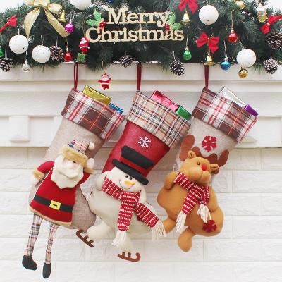 China 2021 New Design Stuff 2021 Christmas Festival Plaid Christmas Decoration Cartoon 3D Embroidery Canvas Stocking for sale