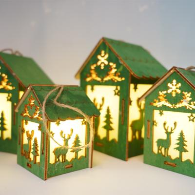 China Festival Stuff Fashion Simple Green Wood Carved Elf Pattern Tree Wood Ornaments Christmas Glow Laden Booth For Family for sale