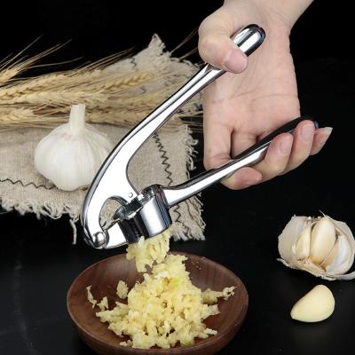 China Viable Zinc Alloy Manual K and B Kitchen Garlic Press Crusher Kitchen Instrument Accessories for sale