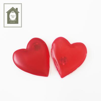 China Comfortable Magical Warm Cold Packed Red Heart Shape Reusable Gel Pocket Hand Warmer for sale