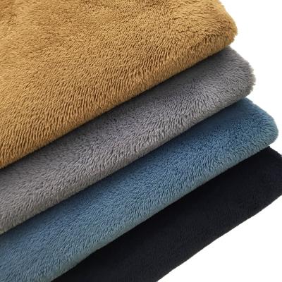 China Double Faced Double Sided Full Extinguishing Wadding Solid Plush To Keep Warm Garment Fabric 100% Polyester Knitted Fabric For Pajamas for sale