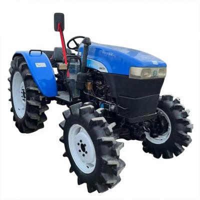 China Factory New Used Holland 4x4 Tractor 50hp 70hp Farm Grass Cutter Snh704 Used Tractor For Agriculture Shanghai Model Snh Tractor for sale