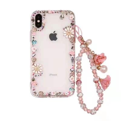 China Hot Selling 3D Series Sparkle Rhinestone Diamond Bling Case With Wrist Shockproof Handmade Strap For Iphone 11 12 13 pro Max Case for sale