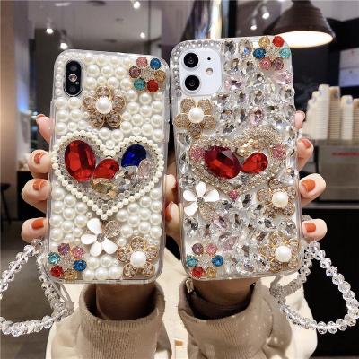 China 3D Series Luxury Handmade Rhinestone Shockproof Sparkle Full Diamond Cover Bling Case With Wrist Strap For iphone 12 pro Max Case for sale