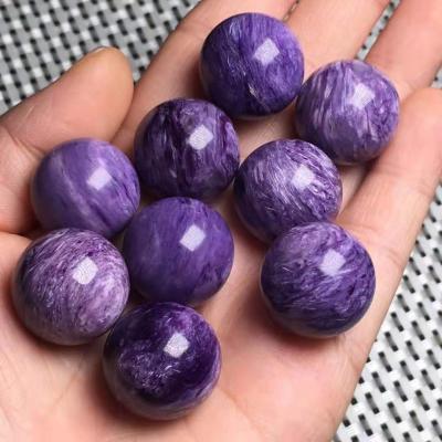 China China wholesale natural purple sphere charoite crystal ball dragonshard purple ball for sale