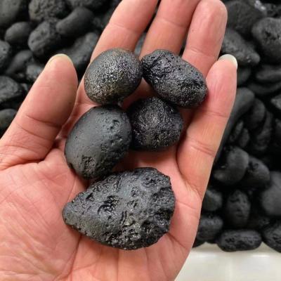 China China good quality raw rough stone crystal tumbled meteorite stone gravel black tektite for feng shui for sale