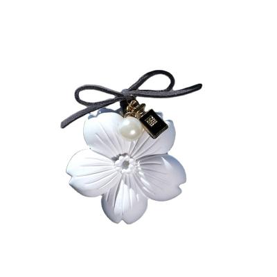 China Fashion Style Cherry Blossom Ceramic Car Rear View Mirror Fancy Interior Hanging Pendant for sale