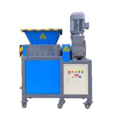 China Non-metal scrap plastic shred shredder twin shaft metal shredder machine with dual motor for sale