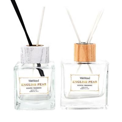 China Fashionalbe 200ml Empty Clear Luxury Square Reed Diffuser Glass Bottle Home Aroma Diffuser Wooden Cap for sale