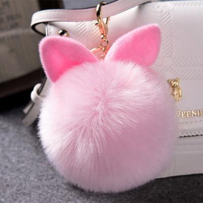 China Plush Faux Fur Pompom With Ear Key Chain For Hanging Bag Pink Color for sale