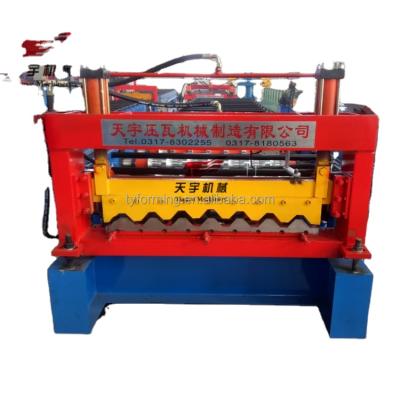 China Hotels Aluzinc Roof Panel Making Machine Aluminum Roofing Sheet Roll Forming Machine / Hydraulic Wall Tile Cold Forming Machine for sale