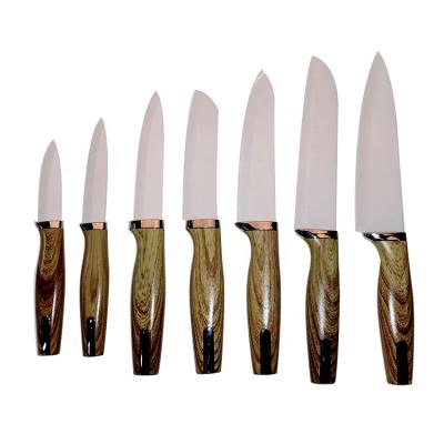 China Durable Kitchen Soft Coating Wood Handle 7 Pieces Non Stain Ceramic Knife Set Kitchen Knife for sale