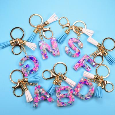 China Wholesale European and American Bling A-Z Letter Valentines Couple Tassel Kids Cute Custom Acrylic Resin Metal Sublimation Accessories Key Chain for sale