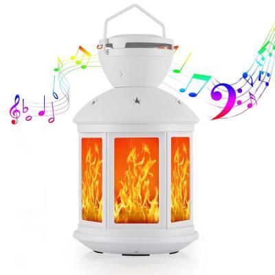 China Portable Custom Portable Camping LED Flame Lamp Wireless Bluetooth Speaker for sale