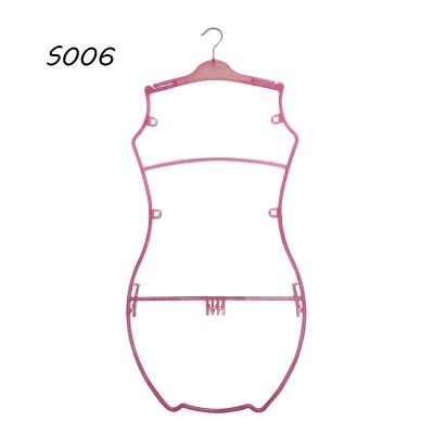 China CLASSIC Eco-Friendly Plastic Fashion Body Shape Pink Hanger for sale