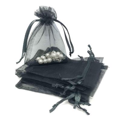 China Promotion Mixed Colors Organza Drawstring Jewelry Pouches Wedding Party Christmas Favor Gift Carrier Bags à venda