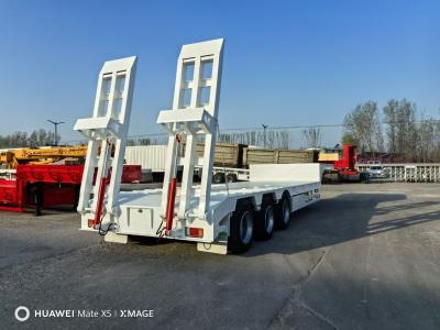 China 3 Axles Heavy Duty 60/80/100 Tons Lowbed Chassis Tractor Flated Bed Semi Trailer for sale