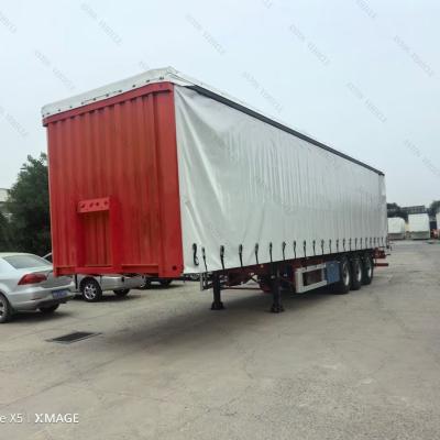 China Jost E100 Landing Gear 3 Axle 40 Ton PVC Curtain Side Opening Semi Trailer for Transport for sale