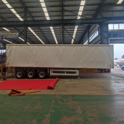 China 3 Axles 60 Tons Flated Low Bed Curtain Side Wall Cargo Semi Trailer 8.5t for sale