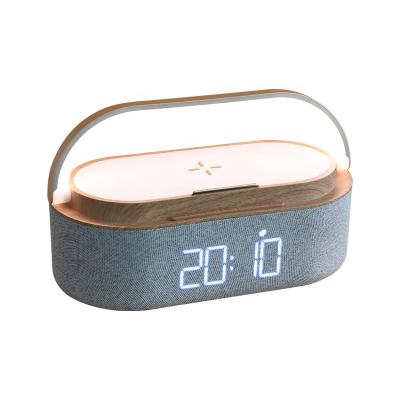 China Bluetooth Speaker 2022 Mold Private Wireless Charger Wireless Speaker with Alarm Clock and LED Lamp for sale