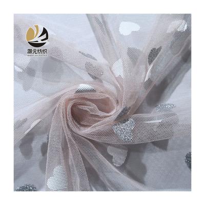 China New Design Breathable Hot Cheap Price 35GSM Polyester Heart Pink 100% Sale Tulle Fabric for sale